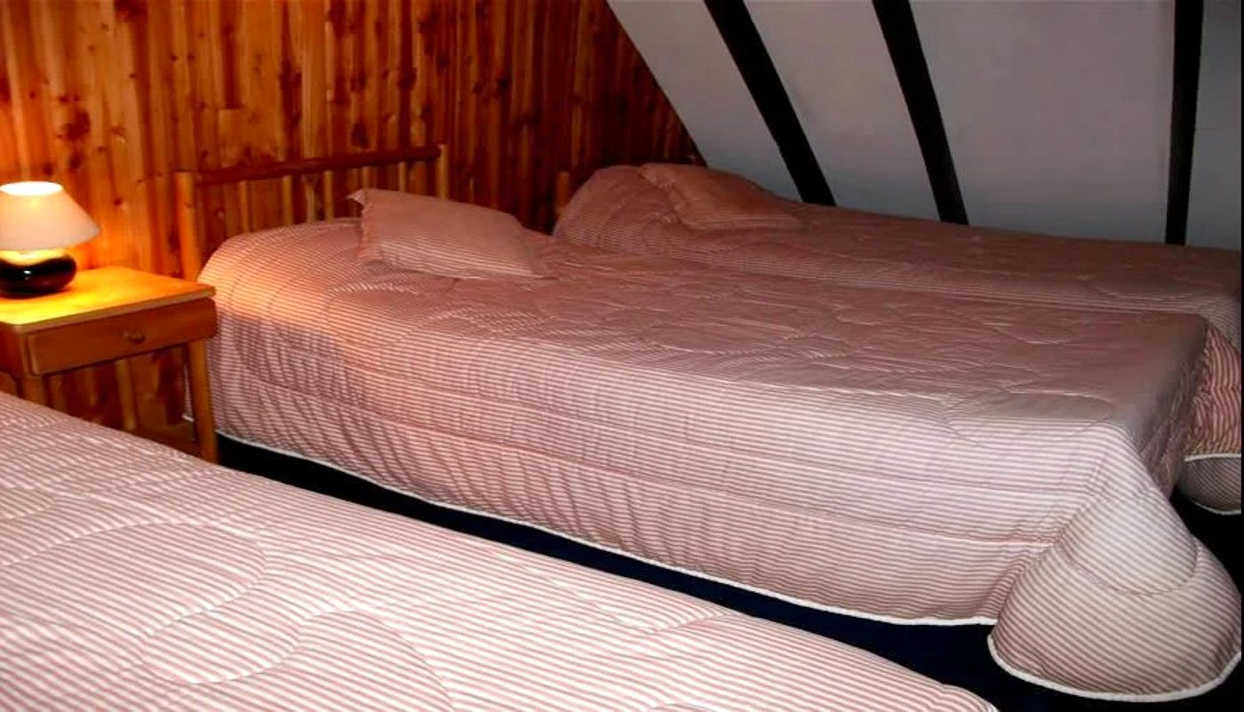 Dormitorio con camas